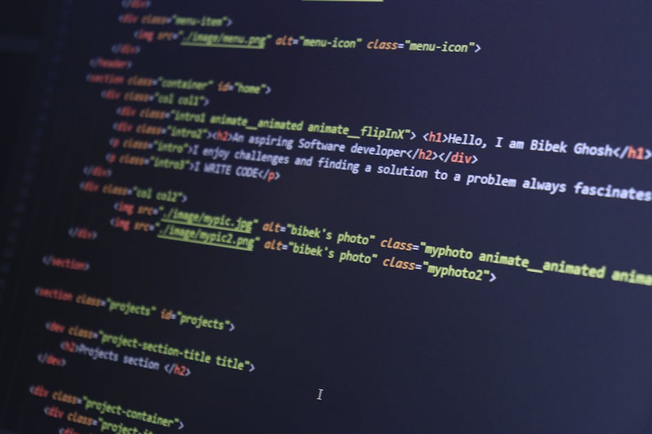 A close-up digital photograph displaying a computer screen with colorful HTML and CSS code snippets, including tags like <h1>, <div>, and <img>. The code features various elements such as class and al